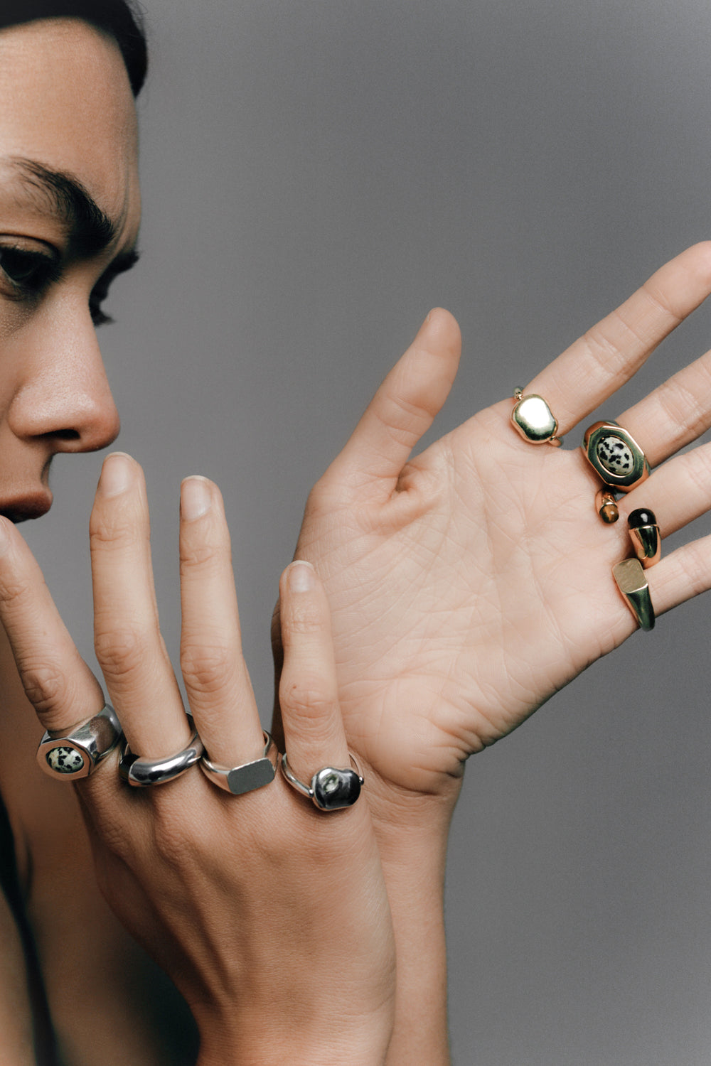 Cushion Ring shown across both hands in 925 silver and 14k gold, alongside other INO rings.