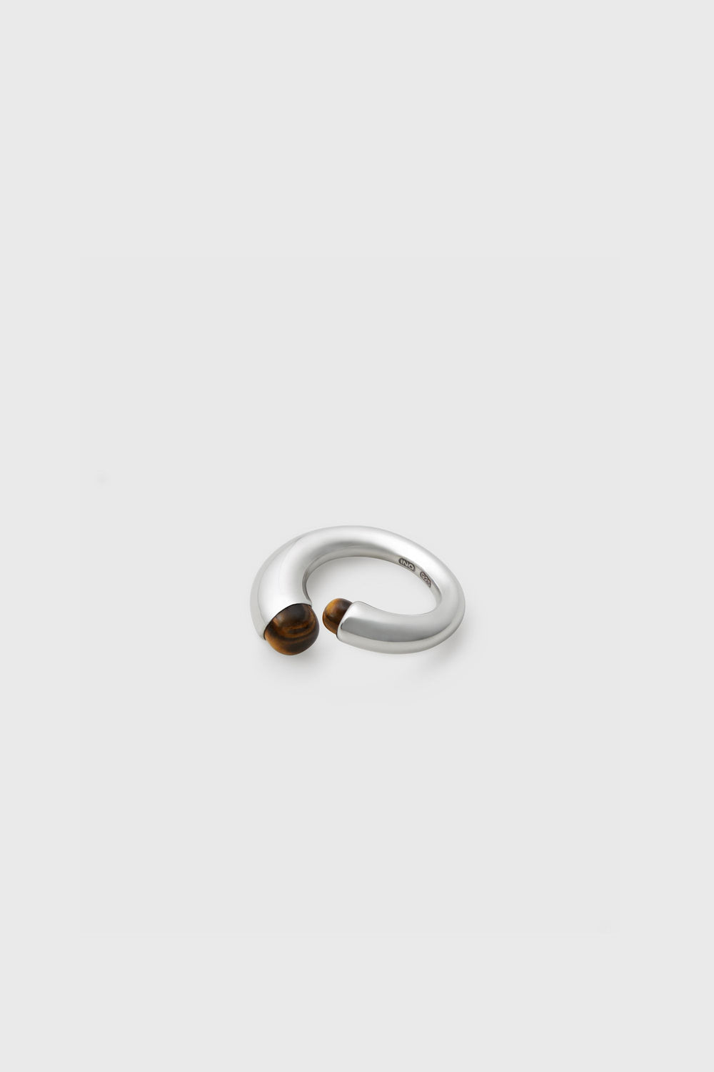 Mushroom Ring sterling silver open ring with tiger's eye cabochon terminals, overhead angle showing INO 925 hallmark on inner band
