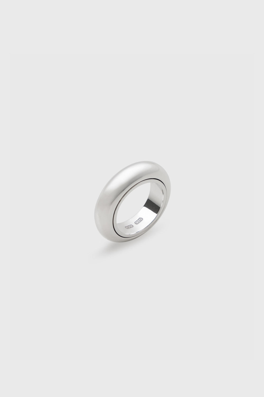 Onion Ring sterling silver dome ring, polished finish, angled view showing band interior with 925 and INO maker's marks